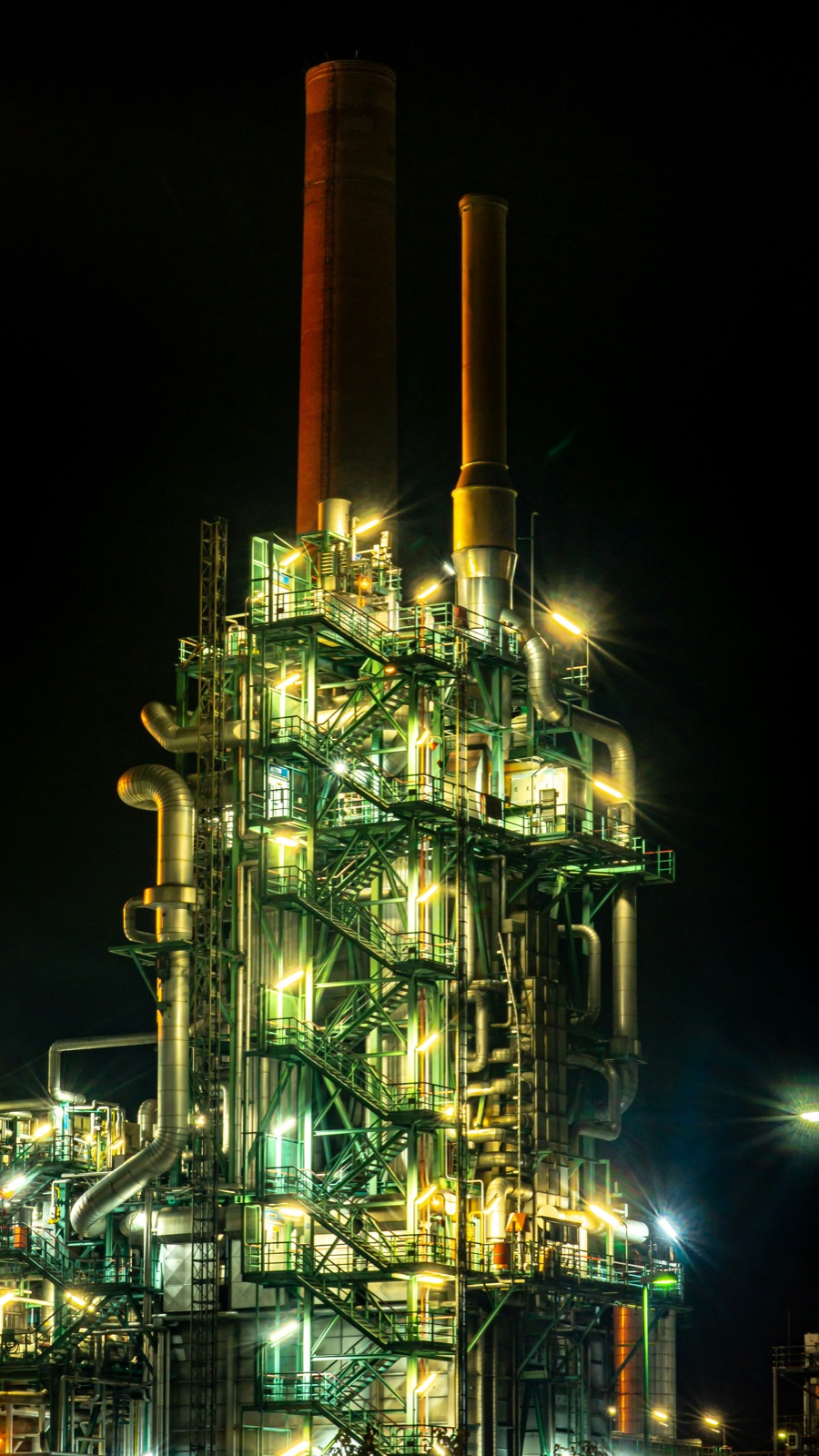 Brown and black industrial factory at night for Epo-Weld™ high emissive ceramic coating high-temperature kiln