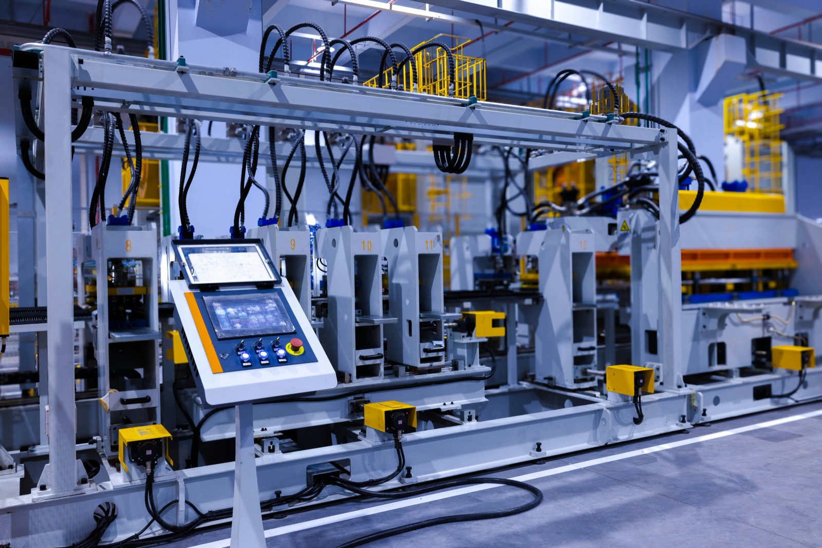 Industrial machine inside factory building for Epo-Weld™ HTE high-temperature epoxy high-vibration assembly bonding