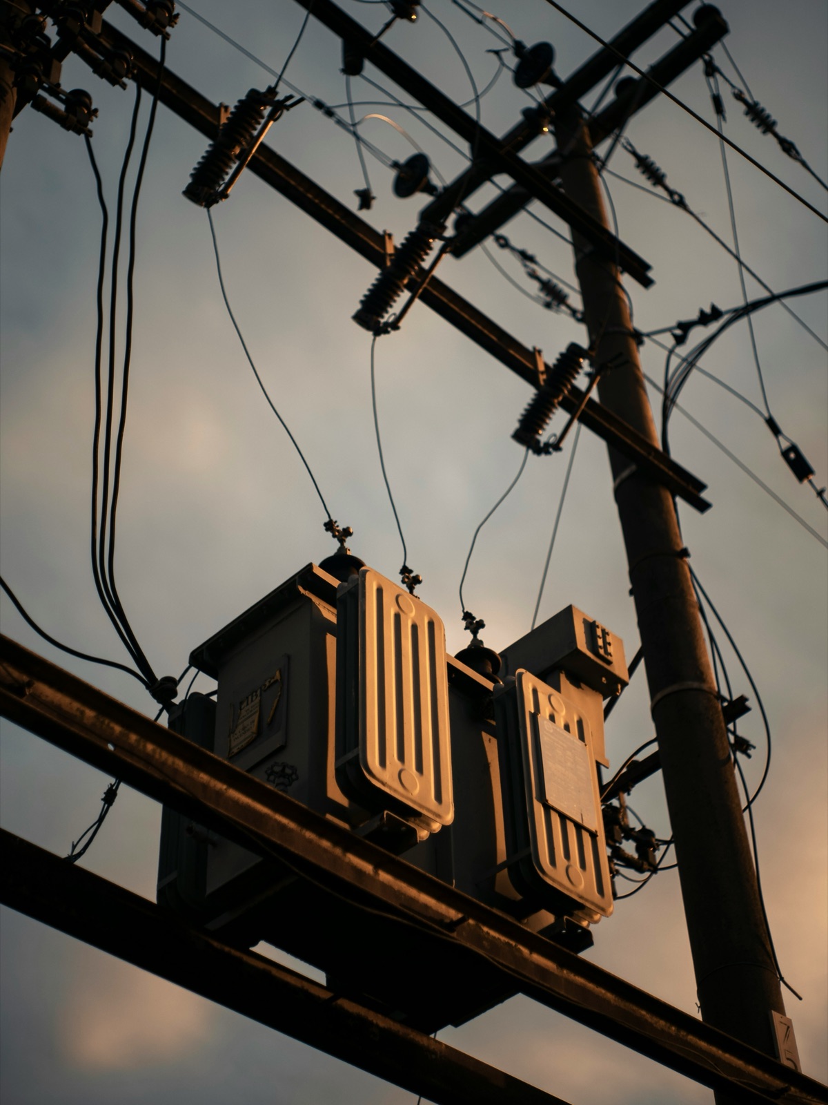 Telephone pole with wires in industrial setting for Epo-Weld™ HTP high temperature potting compound connector sealing