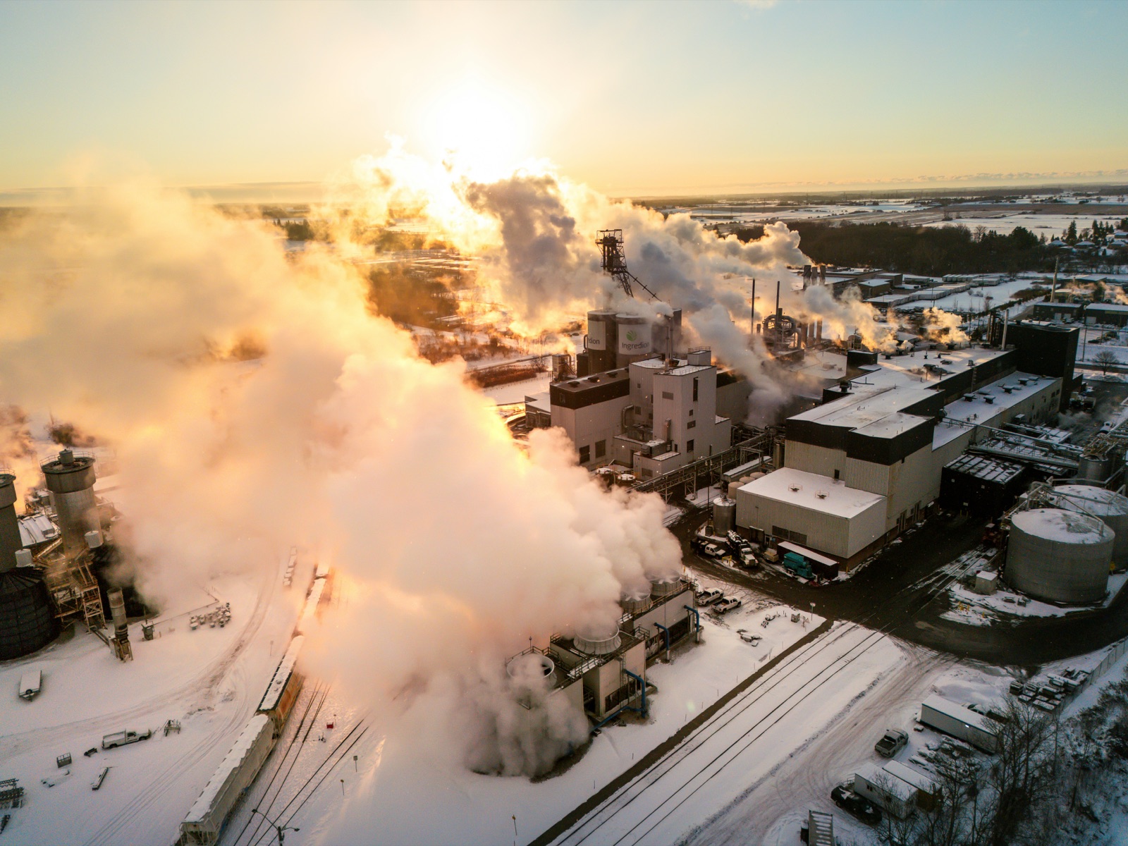 Industrial plant emitting steam on cold sunny day for Epo-Weld™ UHB ultra high bond epoxy cryogenic engineering