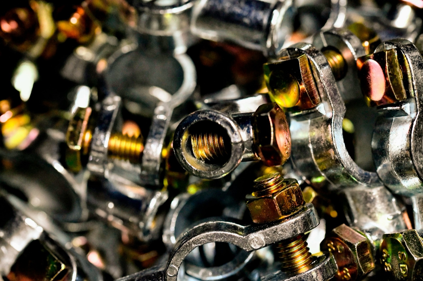 Pile of metal fittings and nuts for Epo-Weld™ UHTC ultra high temperature coating thermal cycling resistance application