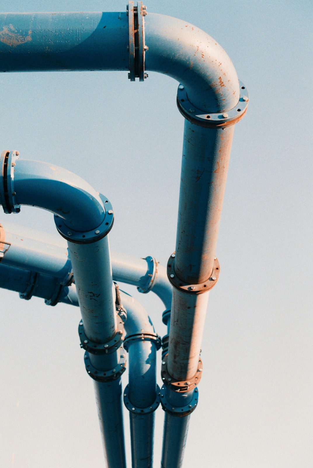 Industrial pipe flanges and ductwork sealed with Epo-Weld™ HTSS high temperature silicone sealer