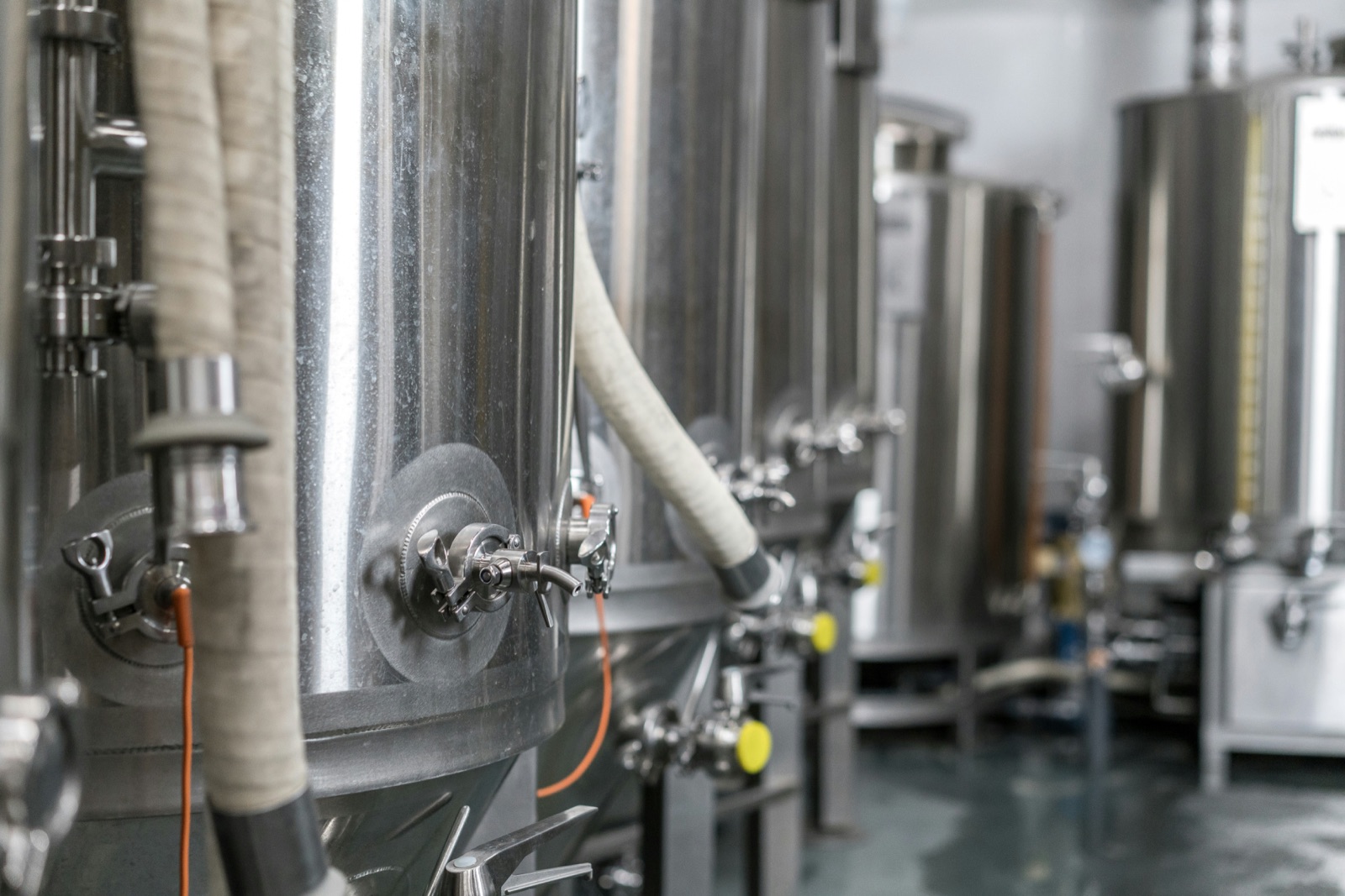 Closed industrial process piping system with valve and fitting seals using Pyra-Sil™ 802 high vacuum silicone grease